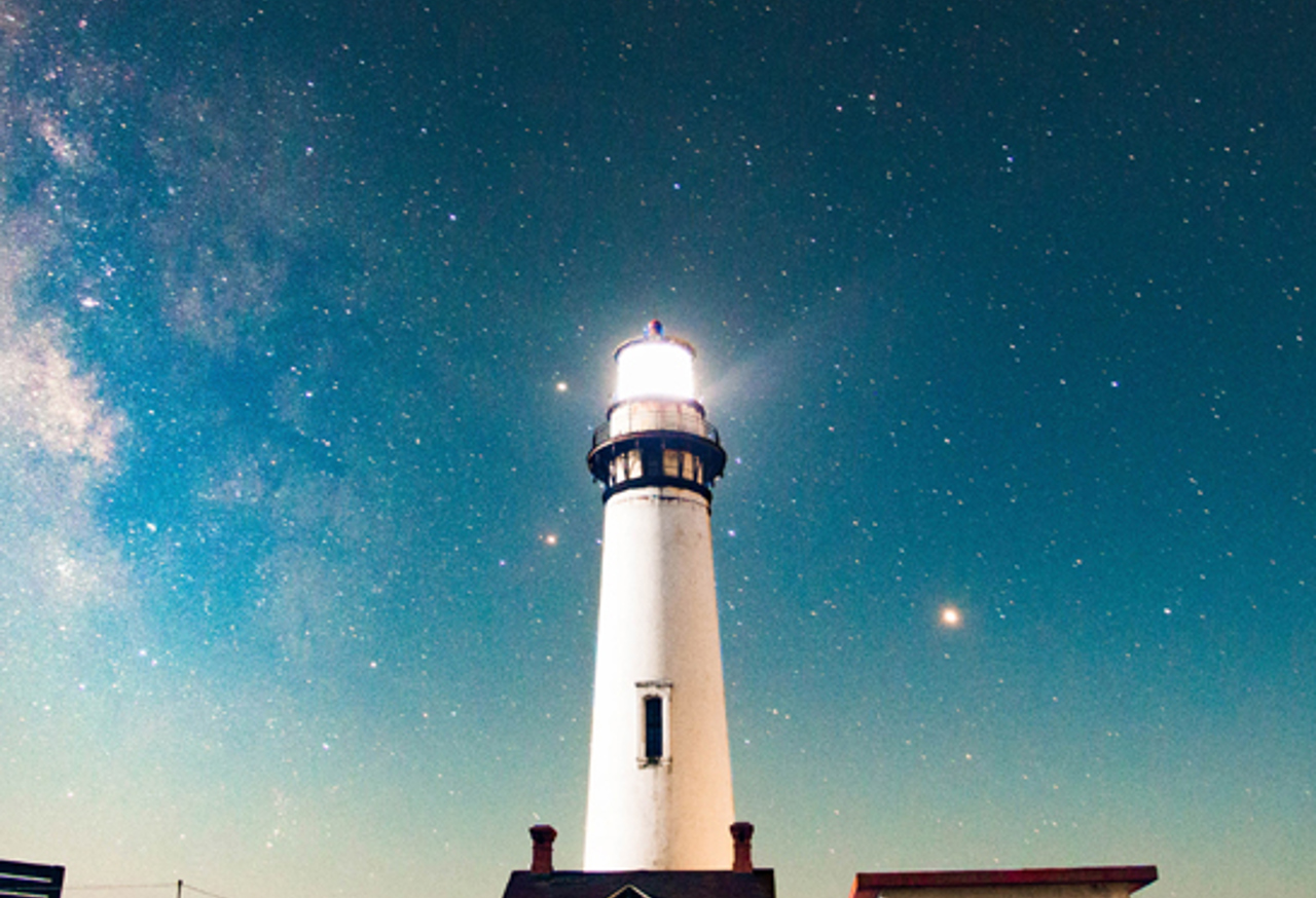 Lighthouse with stars in the sky