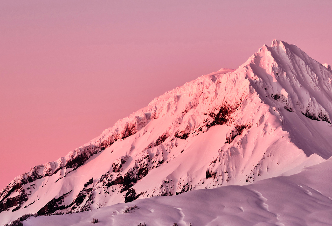 Mountain range against pink sky