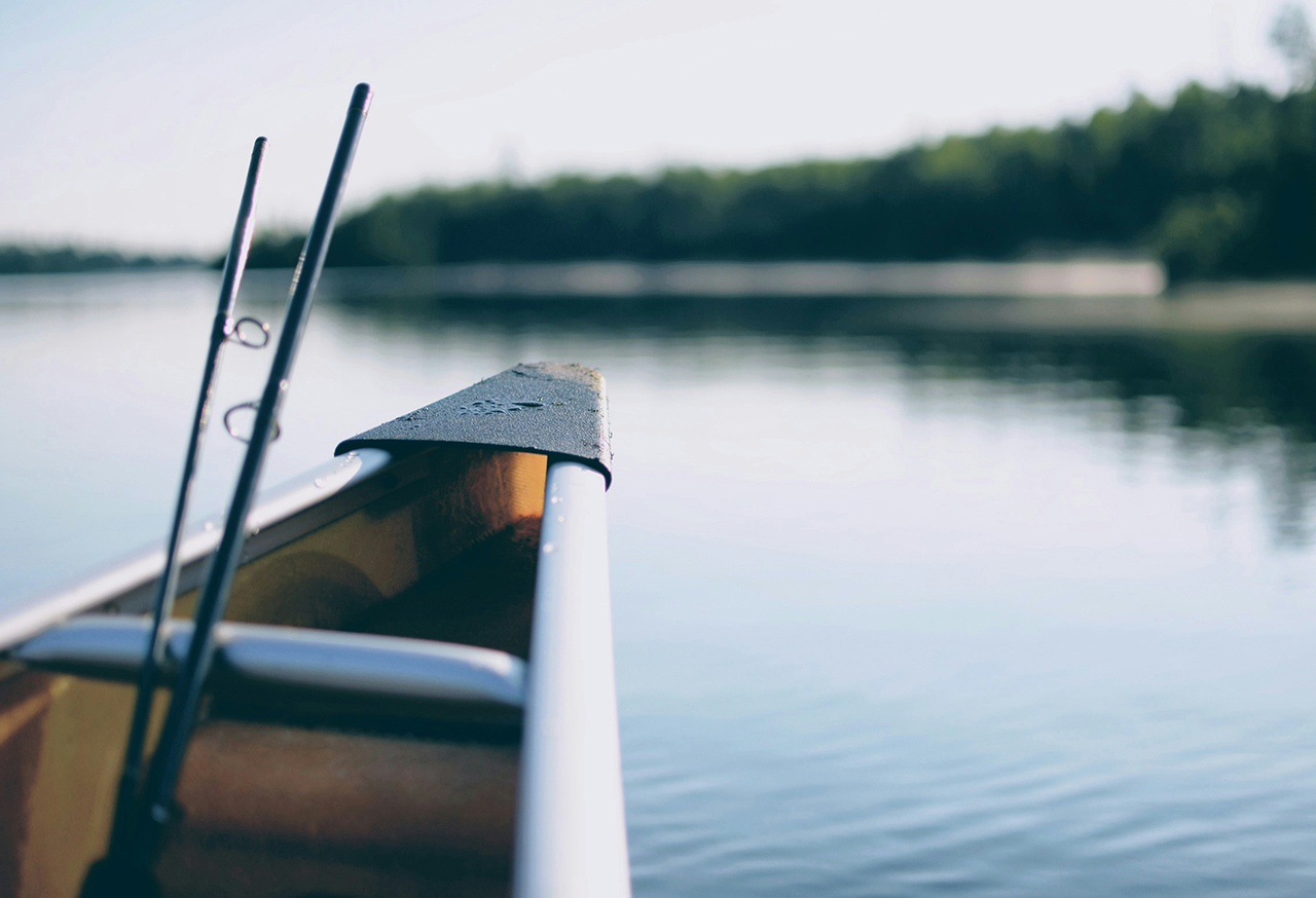 Fishing boat on a calm lake